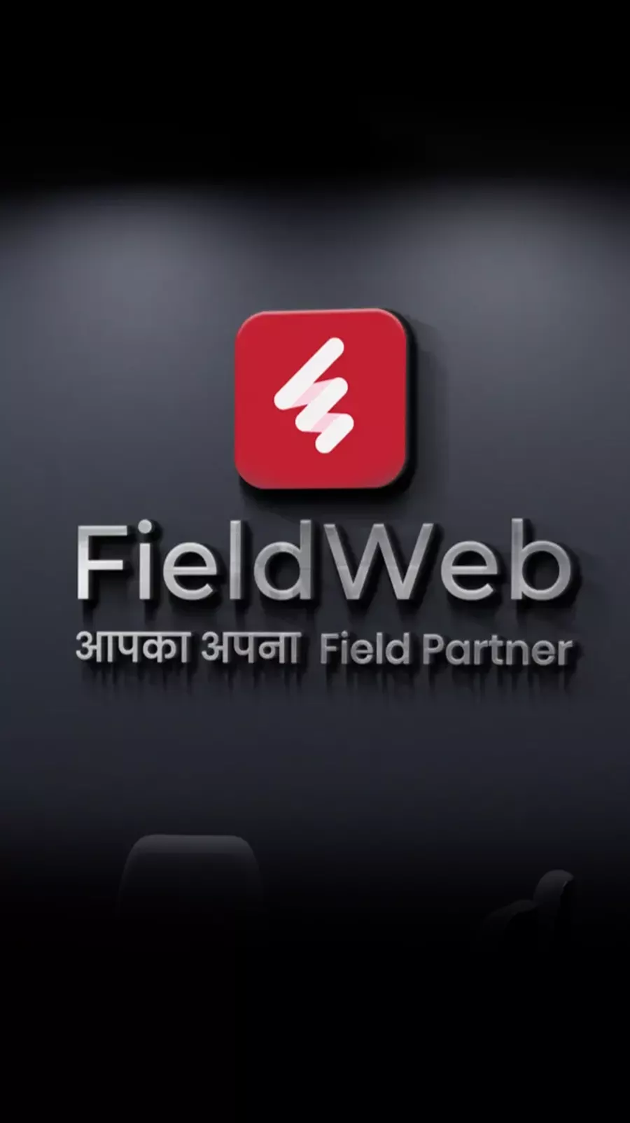 showing fieldweb logo with tagline on grey wall