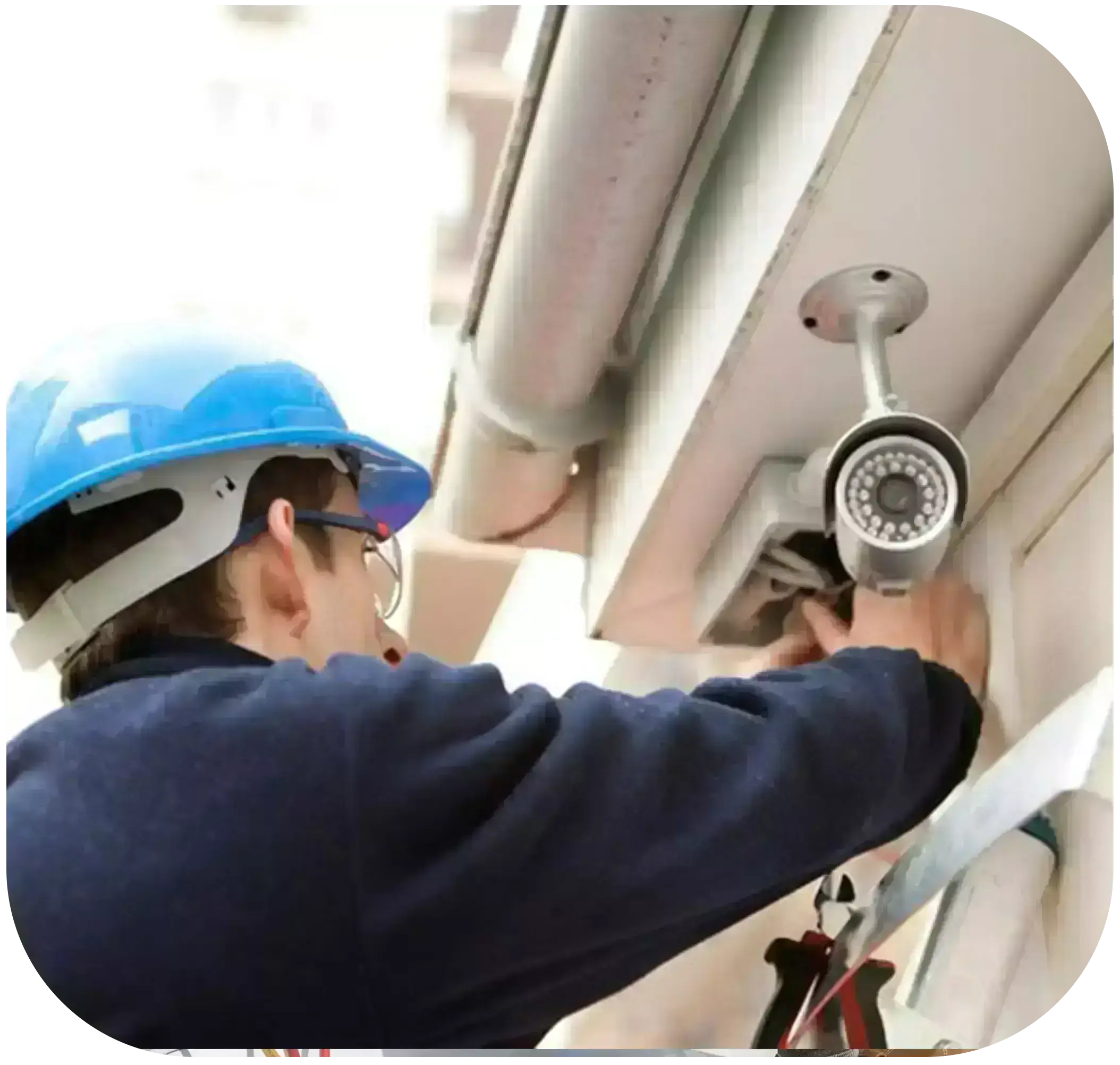 technician repairing the CCTV camera