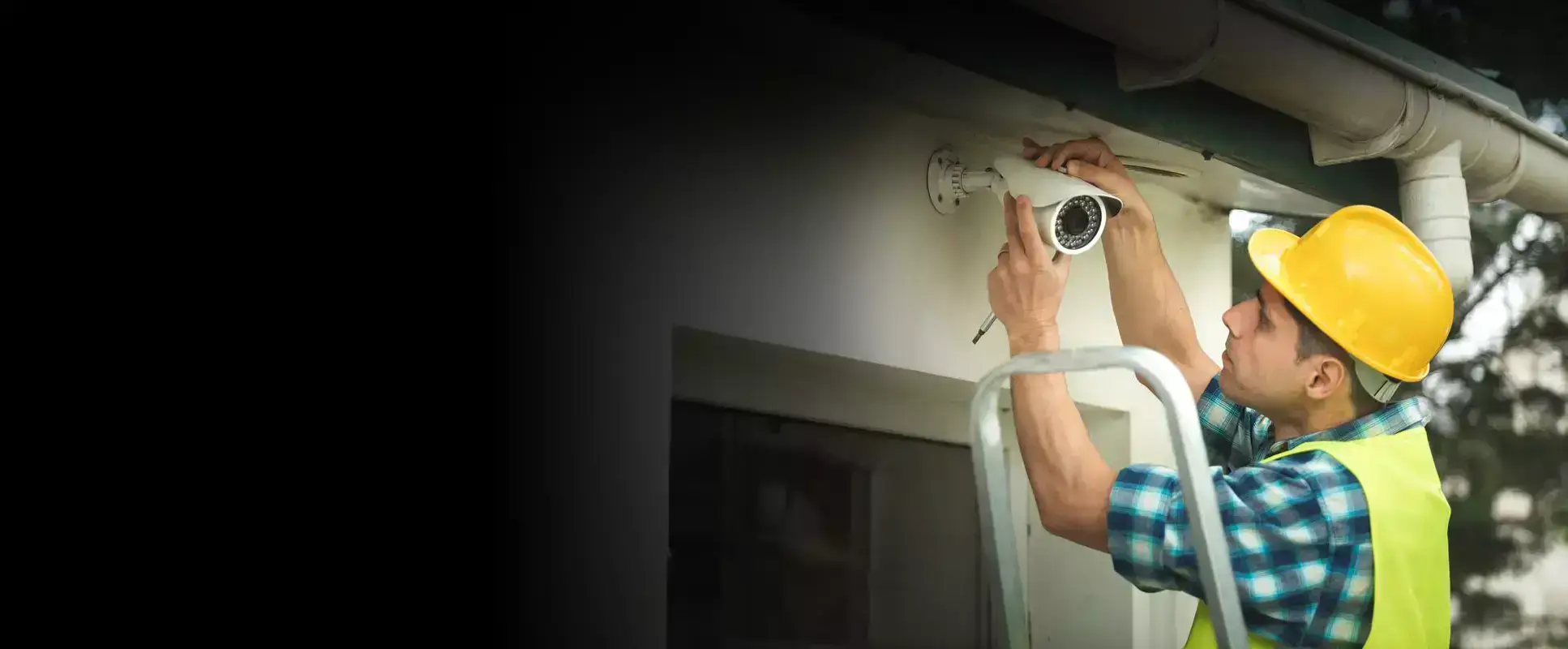technician checking CCTV camera