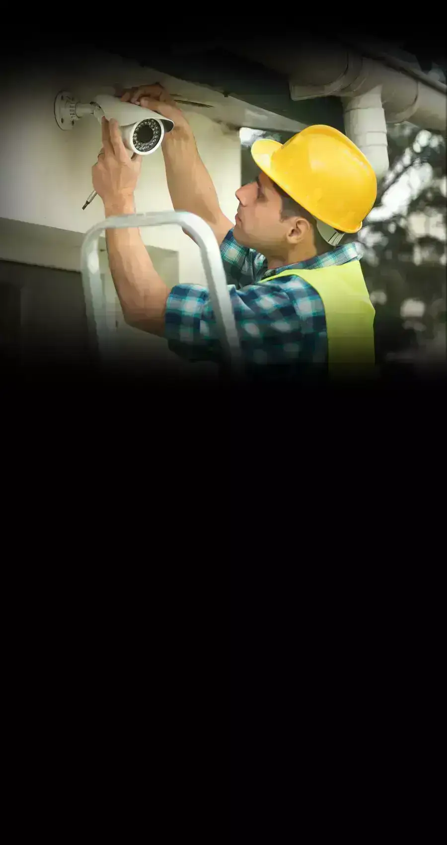 technician checking CCTV camera